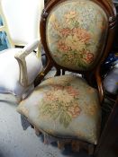 An antique mahogany spoon back chair