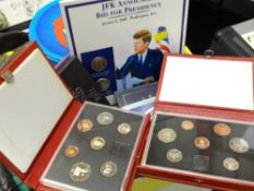 A collection of cased & packaged uncirculated coin sets including Royal Mint 1985 & Royal Mint 1988