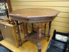 An Edwardian hexagonal occasional table with lower planter stand tier