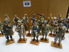 A very large collection of Del Prado 'Men at War' figures with labels & official merchandise
