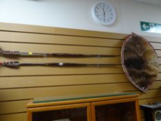 A framed print AFTER SIDNEY RICHARD PERCY, a Kenyan tourist antelope skin shield & a pair of spears