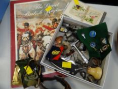 A parcel of curios including a nineteenth century ivory monogrammed cane handle, sundry military