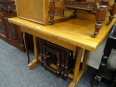 A vintage draw leaf dining table