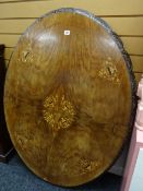 An antique marquetry top oval table (base distressed)