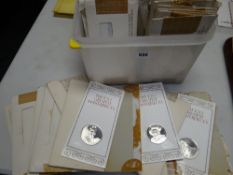 Approximately forty walleted John Pinches collectable silver medallions for 'The Hundred Greatest