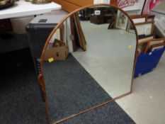 A vintage wooden framed arched topped mantel mirror