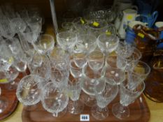 A tray of drinking glasses & a quantity of cut glass & other glass tableware
