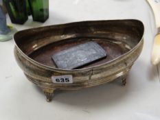 A Georgian silver cruet stand (distressed) & a Chinese 'ingot'