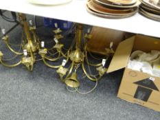 A pair of modern brass effect six-branch hanging ceiling lights & shades