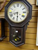 A lustre metal 'knight in armour' fireguard together with an antique American pendulum wall clock