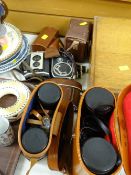 A parcel of vintage cameras together with two cased sets of binoculars
