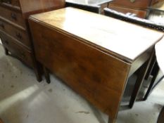 A nineteenth century oak gate leg table