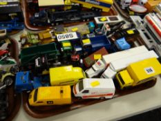 A quantity of unboxed smaller Diecast commercial vehicles etc