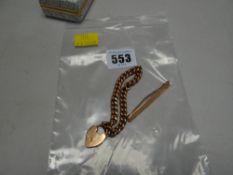 A 9ct yellow gold link bracelet with heart shaped padlock, 25.6gms together with an unmarked