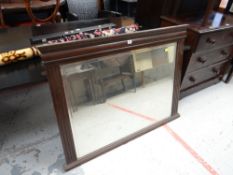 A mahogany framed bevelled overmantel mirror