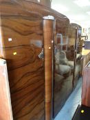 A good polished bedroom suite comprising pair of bed ends, ladies' & gent's double wardrobes, nicely