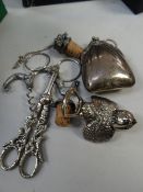 A parcel of white metal items including grape scissors, vintage 'oyster' purse, bottle stoppers etc