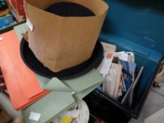 A deed tin containing postcards, a vintage bowler hat etc