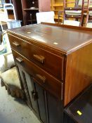 A vintage polished tallboy