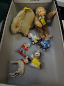 A vintage rabbit pin cushion, a small soft toy monkey & three believed Wade Noddy figures etc