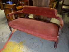 An Edwardian open backed settee