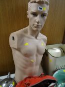 A male mannequin torso