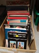 A quantity of reference books for postcard collectors, a pair of commemorative Royal books & a