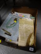 A quantity of unused packaged table linen