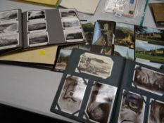 Two albums of vintage postcards & three albums of early twentieth century black & white still