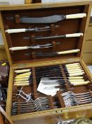 A vintage oak boxed canteen of cutlery