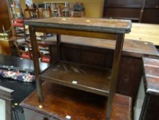 A vintage foldover two-tier card table with baize lined interior