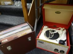 A Damsette record player & a box of records