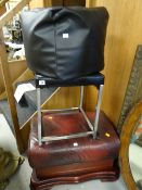 A modern black pouffe, a black leather (or effect) stool on chrome supports & an ottoman