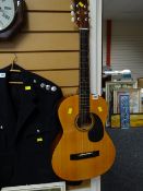 A Hudson guitar company acoustic guitar