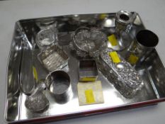 A parcel of silver / part-silver items including Dutch silver caddy spoon, dressing table jar,