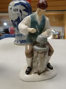A Royal Doulton figure - 'The Silversmith of Williamsburg' 1959