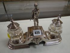 A fine quality EPNS equestrian themed desk stand with mounted jockey knop to a sliding covered