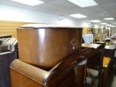 A bow front vintage blanket box