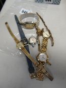 Three vintage yellow metal watches including one marked 9ct together with a 9ct gold expanding watch