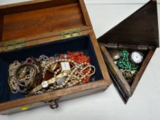 Two wooden boxes of mixed jewellery including coral necklace (coral coming loose from strand), a