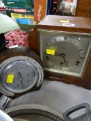 A polished mantel clock & similar horseshoe barometer