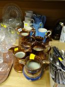 Six copper lustre jugs, a pottery pint tankard & sundry pottery jugs