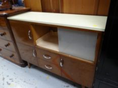 A vintage Formica topped kitchen cabinet