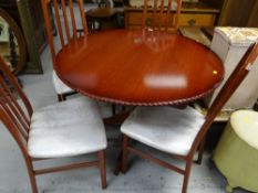 A good modern extending circle / oval dining table & four chairs
