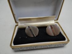 A cased set of German silver cufflinks