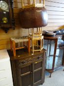 A polished & carved two-door cupboard with drawer