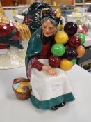 A Royal Doulton model - 'The Old Balloon Seller' HN1315
