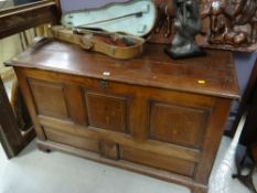 A nineteenth century inlaid oak blanket chest
