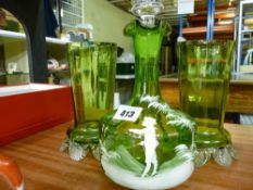 Mary Gregory style green glass decanter and stopper and a pair of green glass vases