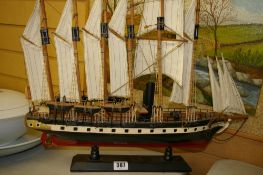 Model of a galleon ship on a plinth